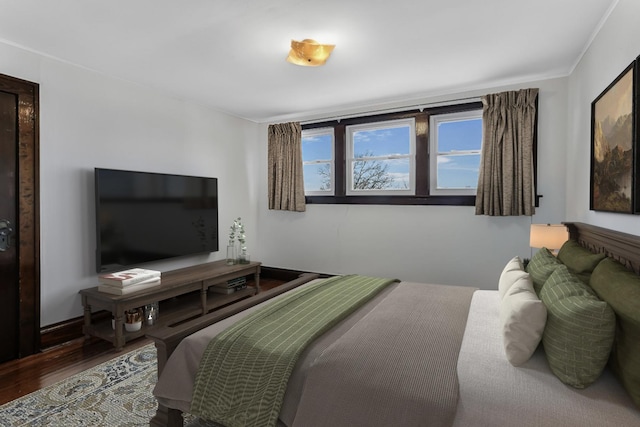 bedroom featuring wood finished floors