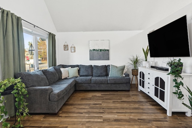 living room with lofted ceiling and dark wood-style floors