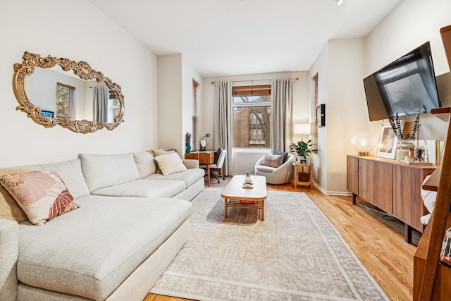 living room featuring light wood-style flooring