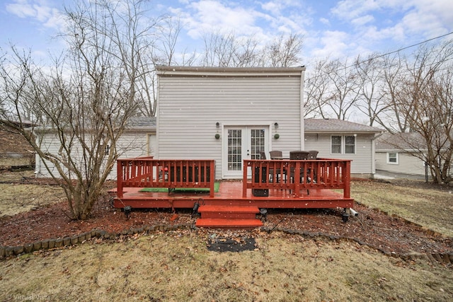 back of property featuring a deck and french doors