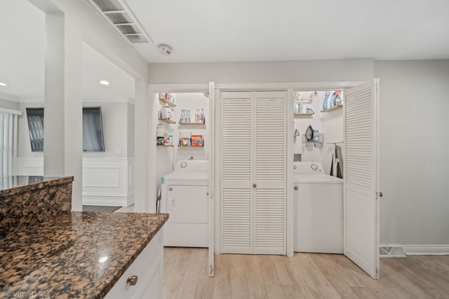 laundry room with visible vents, laundry area, light wood-style flooring, recessed lighting, and washer and clothes dryer