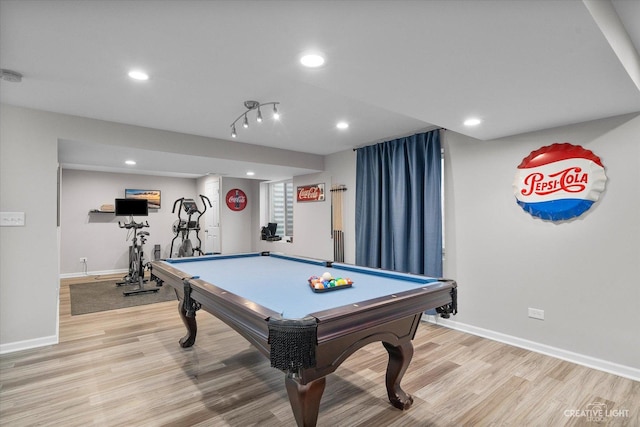 recreation room with recessed lighting, baseboards, and light wood-style floors