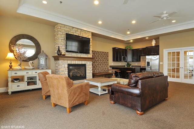 living area featuring a ceiling fan, recessed lighting, french doors, carpet, and crown molding