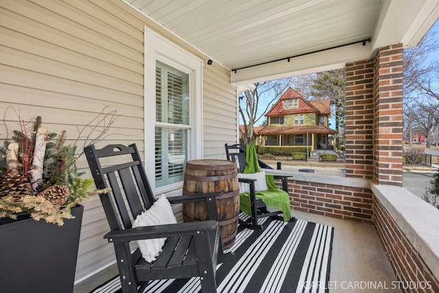 view of patio featuring a porch