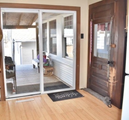 doorway featuring wood finished floors