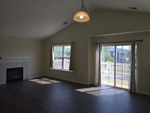 2401 Echelon Cir Unit C, Matteson, IL 60443 - unfurnished living room featuring plenty of natural light, wood finished floors, a fireplace, and high vaulted ceiling
