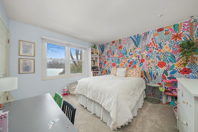 bedroom with carpet and wallpapered walls