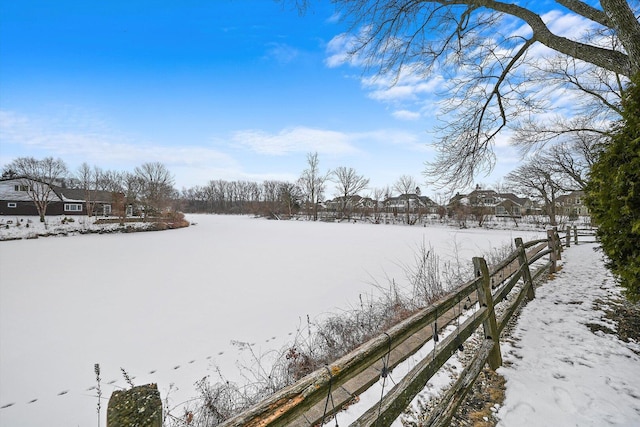 view of yard layered in snow