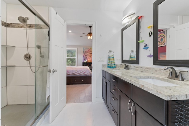 ensuite bathroom featuring a sink, a stall shower, and ensuite bath