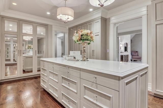 interior space with recessed lighting, wood finished floors, and crown molding