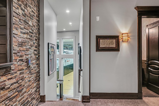 corridor with recessed lighting and carpet