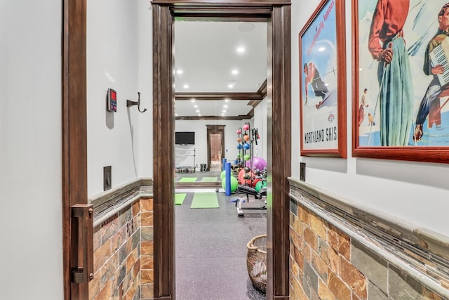 hallway with recessed lighting and ornamental molding