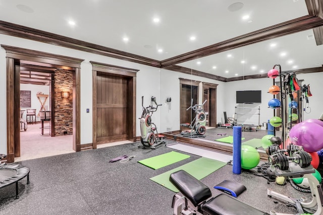 workout room featuring recessed lighting and crown molding