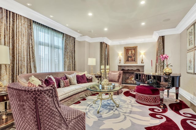 living room with recessed lighting, baseboards, a lit fireplace, and ornamental molding