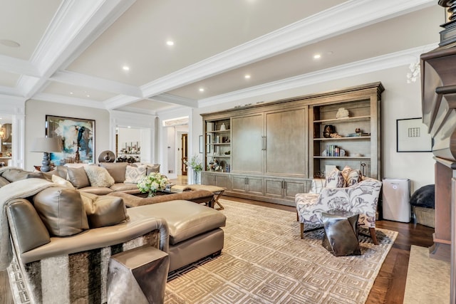 living area with beam ceiling, light wood-style flooring, and crown molding