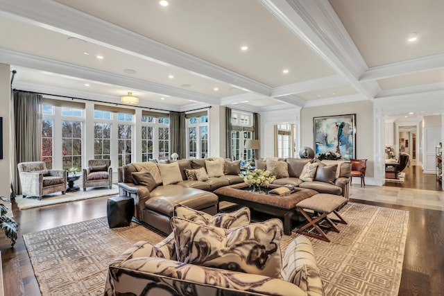 living room with beam ceiling, recessed lighting, crown molding, and wood finished floors