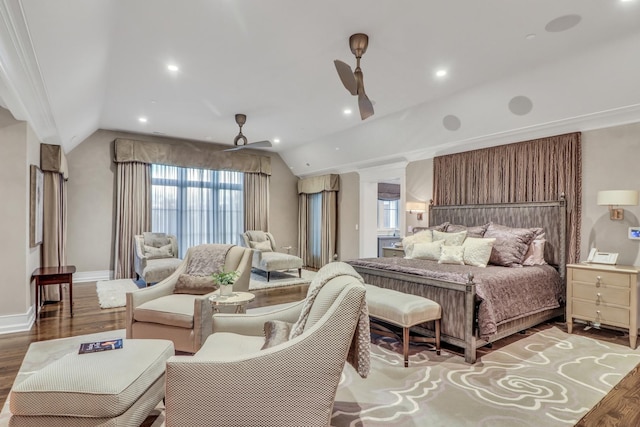 bedroom featuring lofted ceiling, wood finished floors, recessed lighting, baseboards, and ceiling fan