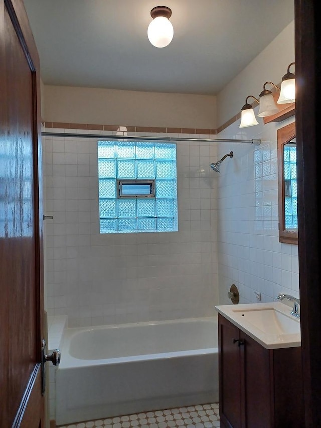 bathroom with shower / washtub combination and vanity