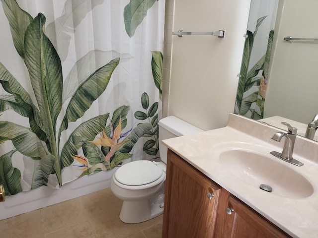 full bath featuring tile patterned flooring, toilet, and vanity