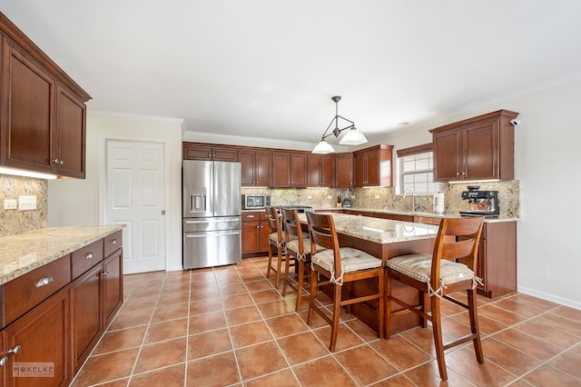 kitchen featuring a sink, appliances with stainless steel finishes, ornamental molding, and light tile patterned floors