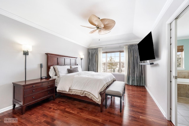 bedroom with ceiling fan, baseboards, a tray ceiling, ornamental molding, and wood-type flooring