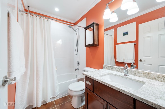 full bathroom featuring vanity, shower / bath combo with shower curtain, crown molding, toilet, and tile patterned floors