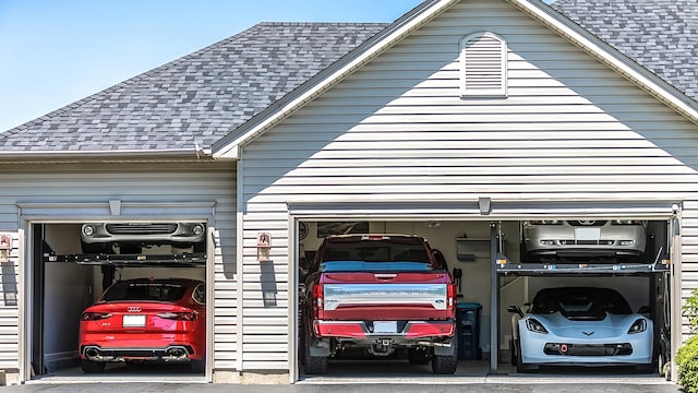 garage featuring driveway