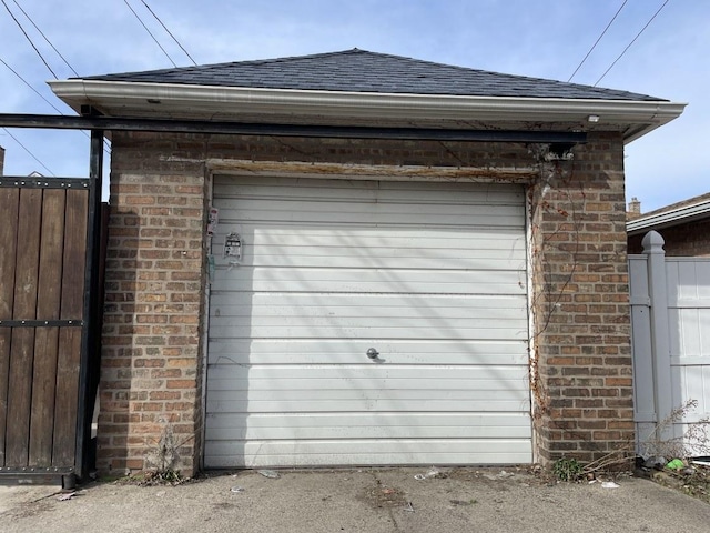 garage featuring fence