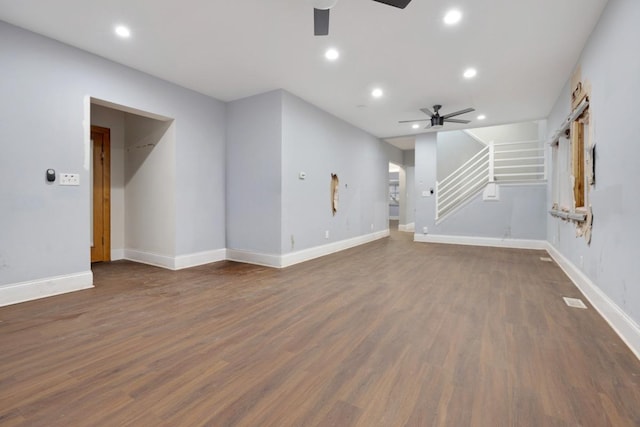 interior space with recessed lighting, stairway, wood finished floors, and a ceiling fan