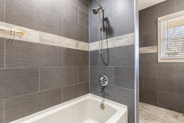 full bathroom with shower / washtub combination