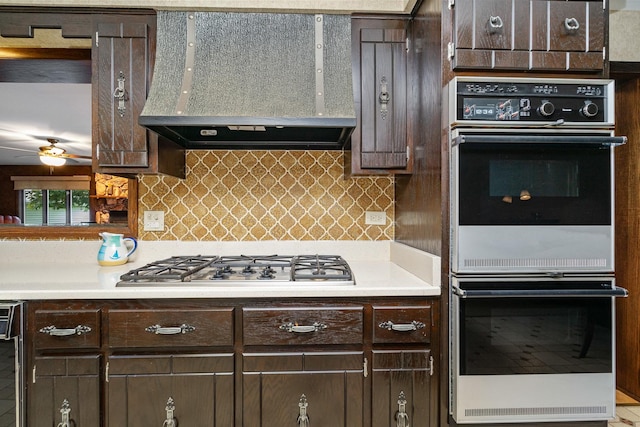 8328 Latrobe Ave, Burbank, IL 60459 - kitchen featuring range hood, white double oven, dark brown cabinets, and a ceiling fan