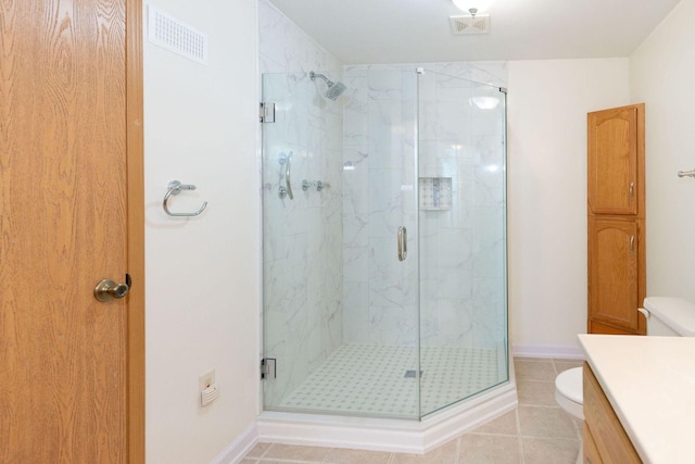 full bathroom with a marble finish shower, visible vents, toilet, and vanity