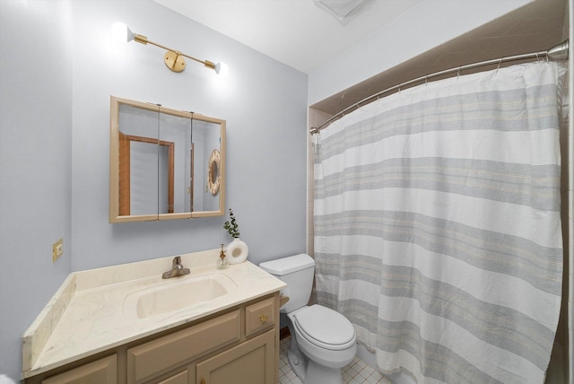 full bathroom with curtained shower, toilet, vanity, and tile patterned flooring