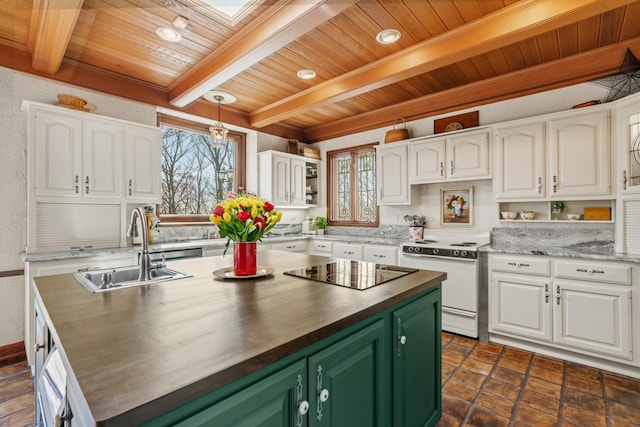 kitchen featuring green cabinets, open shelves, white electric range, and a sink