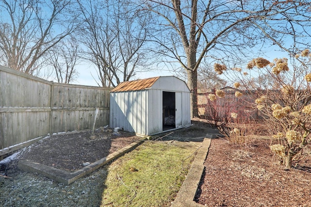 view of shed featuring a fenced backyard