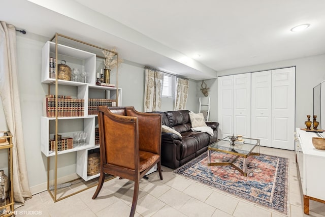 living area with light tile patterned floors