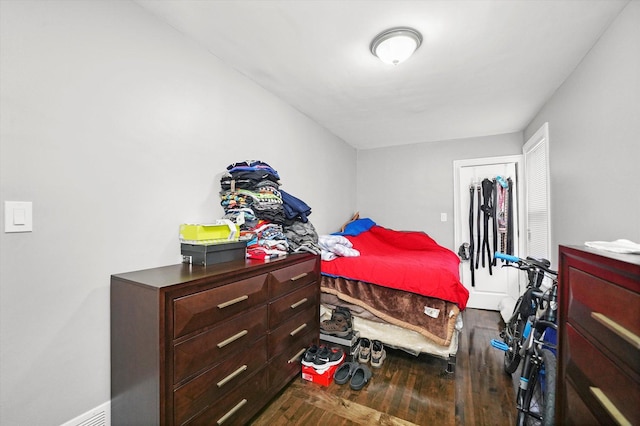 bedroom featuring wood finished floors