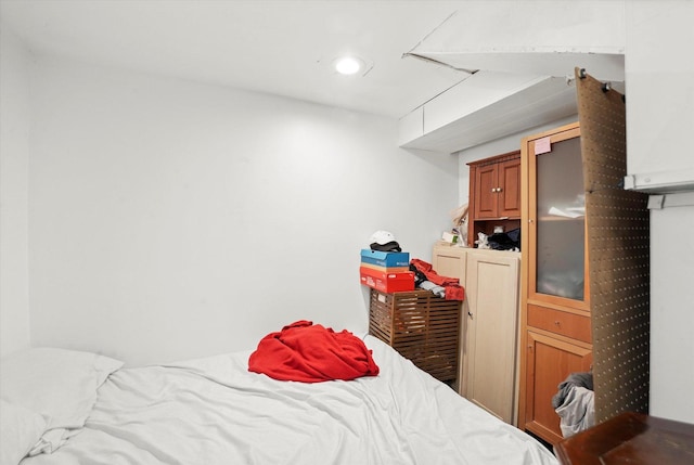 bedroom featuring recessed lighting