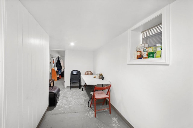 interior space featuring baseboards