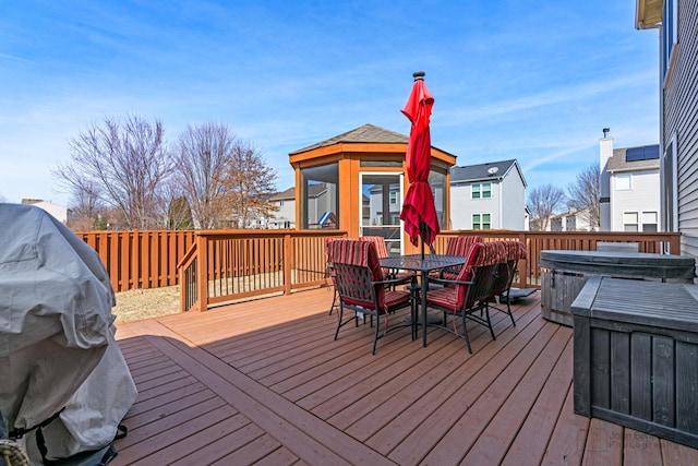 deck with outdoor dining space