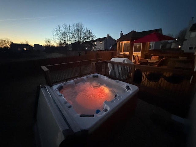 exterior space featuring a hot tub