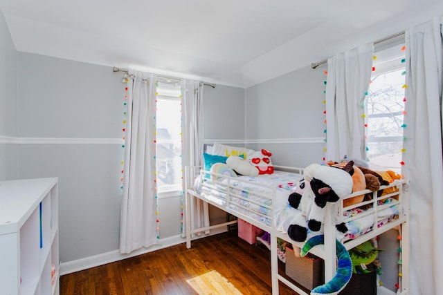 bedroom featuring wood finished floors