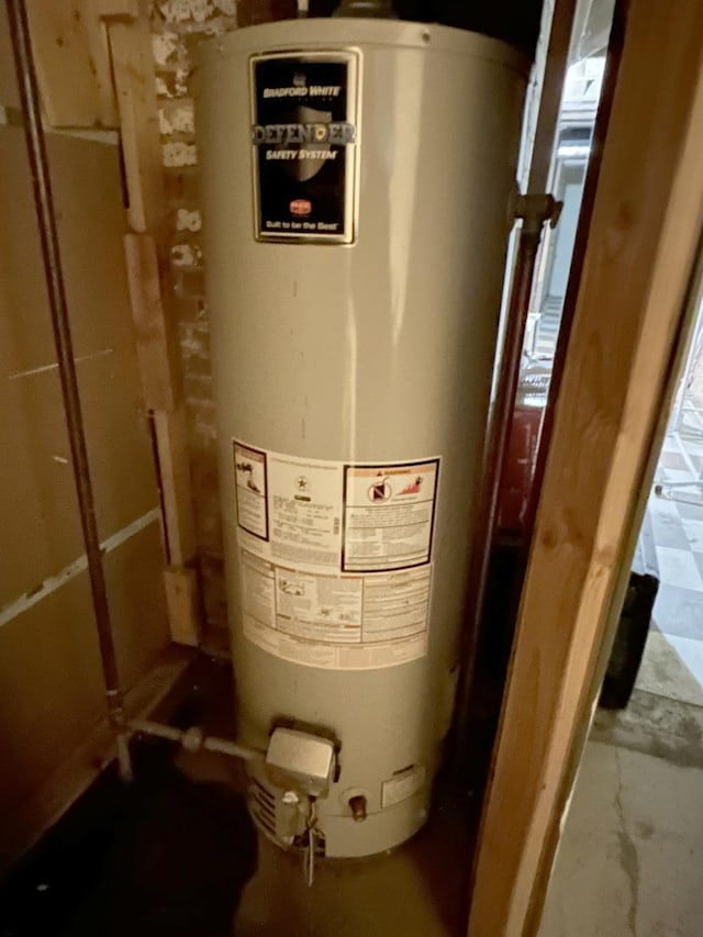 utility room with water heater