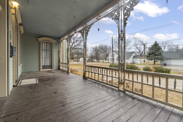 wooden deck with a residential view