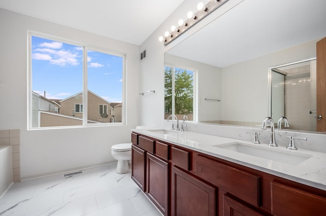 bathroom with visible vents, marble finish floor, and a sink