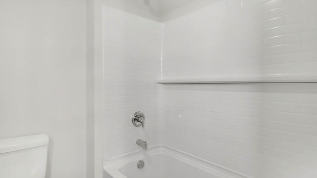 bathroom with toilet and shower / bathtub combination