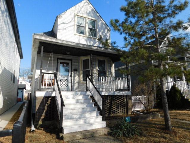 view of front of property with stairs and covered porch