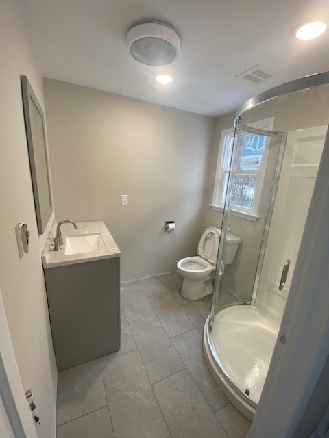 full bathroom with tile patterned floors, visible vents, toilet, a stall shower, and vanity