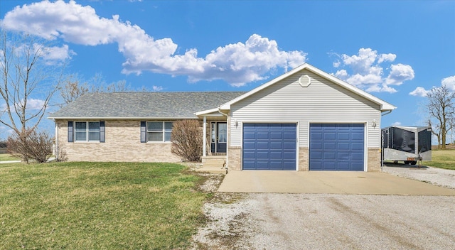 single story home featuring brick siding, a garage, and a front lawn