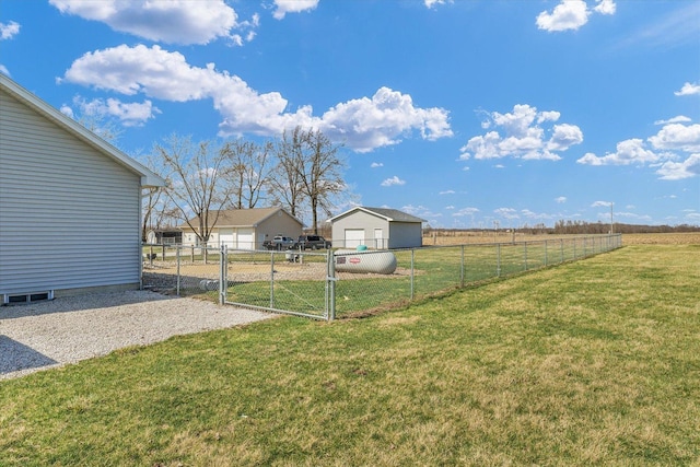 view of yard featuring a gate and fence